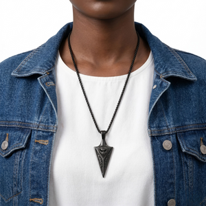 Nordic Totem Pendant on black chain, worn over white shirt and denim jacket