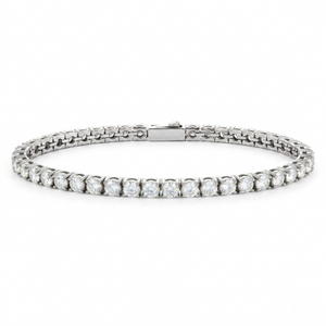Classic silver tennis bracelet with sparkling 5mm round stones, elegant and timeless design.