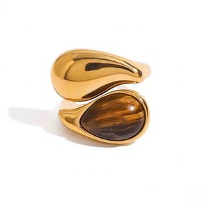 Molten Teardrop Ring in gold with a polished finish and brown stone, modern and elegant design