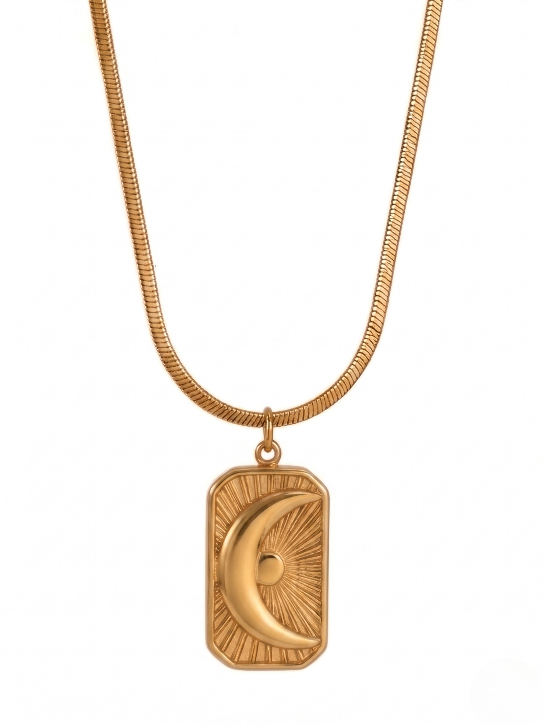 Gold necklace with rectangular medallion featuring crescent moon design and sunburst pattern
