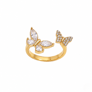 Gold butterfly bypass ring with crystals, featuring two butterfly accents on an open band design