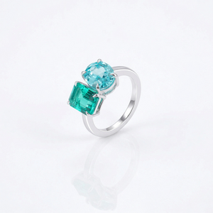 14K white gold ring with round and square-cut lab emerald stones