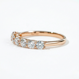 18K rose gold ring with seven 3.0mm lab diamonds in a princess setting