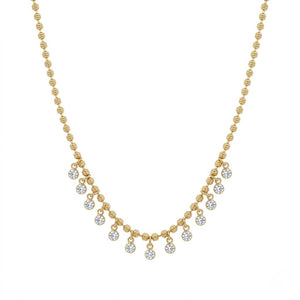 Gold bead chain fringe necklace with multiple dangling bezel-set round diamond charms isolated on a white background | J.Collins Jewelry