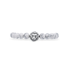 Bracelet with white beads and a lion head charm on a white background-J.Collins Jewery