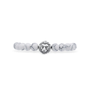 Bracelet with white beads and a lion head charm on a white background-J.Collins Jewery