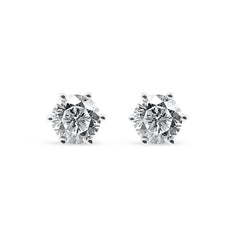 Pair of diamond stud earrings on a white background-Eternal-glow-studs-JCollins Jewelry