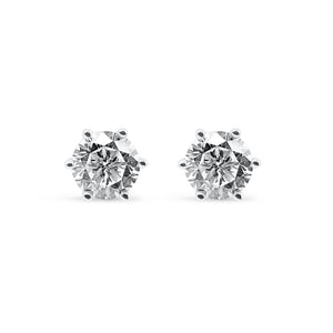 Pair of diamond stud earrings on a white background-Eternal-glow-studs-JCollins Jewelry