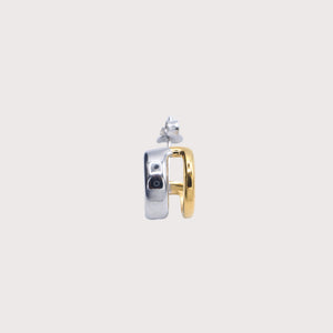Gold and silver earring on a light gray background - Hera Hoop - JCollins Jewelry