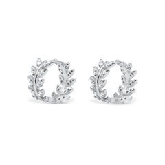 Pair of silver hoop earrings with leaf design on a white background-Imperial-leaf-hoops-JCollins