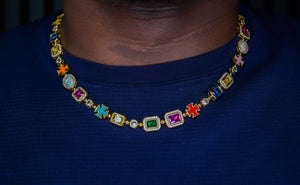 Colorful necklace with gemstones on a blue shirt- MultiColored-Regal-Gem-Chain-JCollins-Jewelry