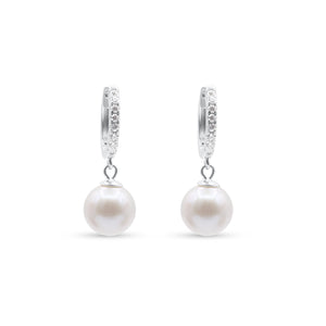 Pair of pearl earrings with diamond accents on a white background-Lumiere-Pearl-Hoops-JCollins Jewelry