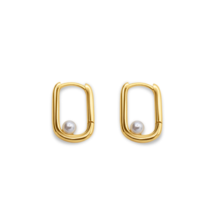 Gold hoop earrings with pearl centers on a white background-Selene-Pearl-Hoops-J.Collins Jewelry