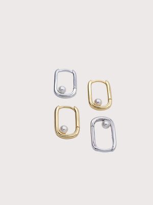 Set of four earrings in gold and silver on a light gray background - Selene Pearl Hoops - JCollins Jewelry