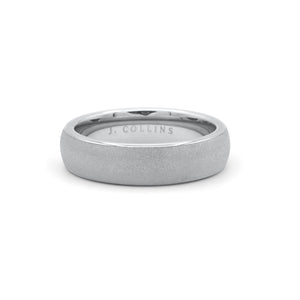 The Titan (6mm) ring with 'J. Collins' engraving on a white background