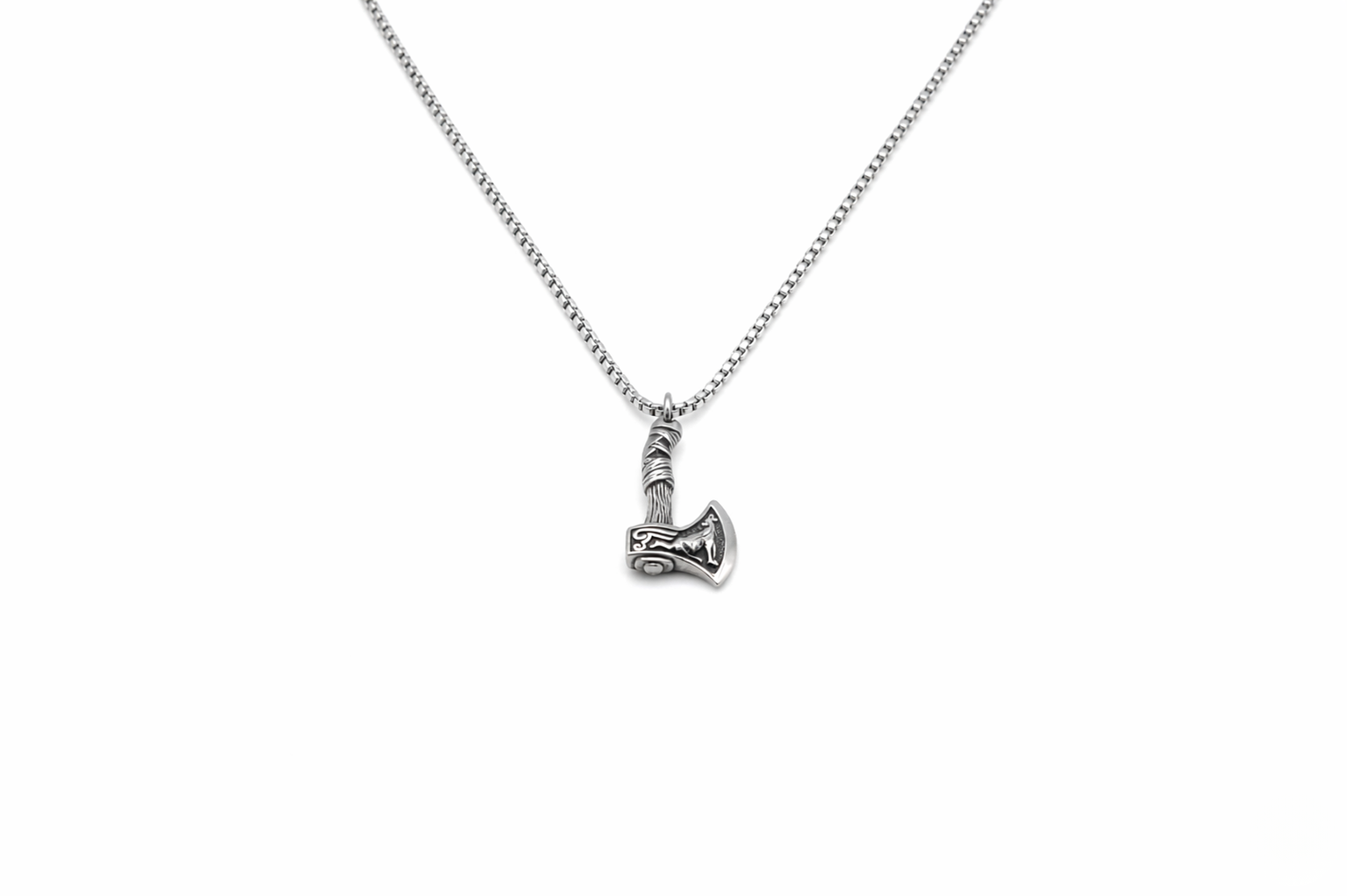 Silver necklace with a small pendant on a white background-J.Collins Jewelry