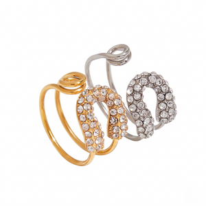 Celestial Sparkle Ring with gold, silver, and crystal-encrusted horseshoe design accents on an elegant band.