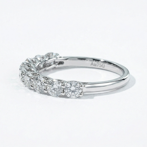 18K white gold ring with seven lab-grown princess-cut diamonds totaling 0.9ct in a sleek band design