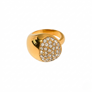 Gold dome ring with crystal embellishments, showcasing a bold and elegant design