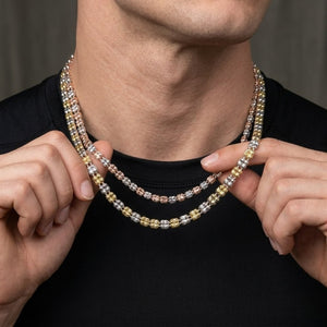 Italian two-tone bead necklace in gold and silver, shown on a person's neck with a black shirt
