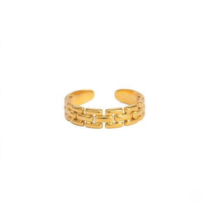 Gold open masonry linked ring with intricate chain-like design on white background