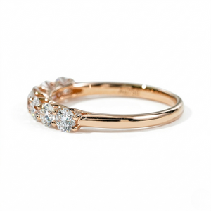 18K gold ring with seven 3.2mm lab diamonds, total 0.9ct, showcasing a delicate, elegant design.