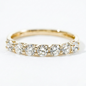 18K gold ring with seven 3.2mm lab diamonds, elegant band style, 0.9ct total weight