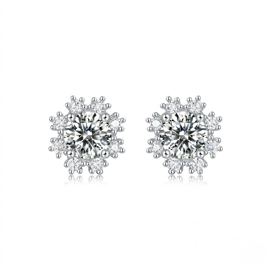 Sterling silver moissanite stud earrings featuring a brilliant round cut snowflake design