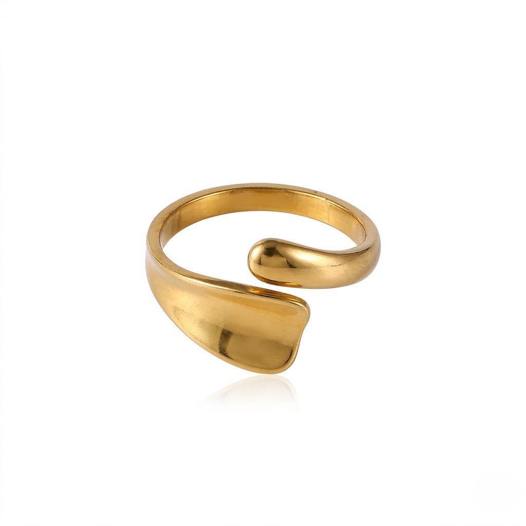 Gold modern wrap-around ring with sleek, minimalist design on white background