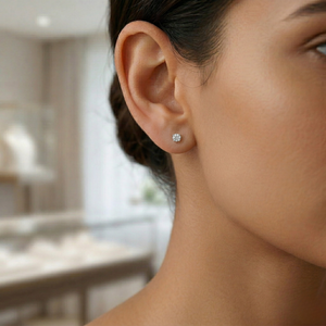 Close-up of a woman wearing a diamond stud earring- 10K Gold Lab Diamond Earrings Basket 0.418ct - J. Collins Jewelry 