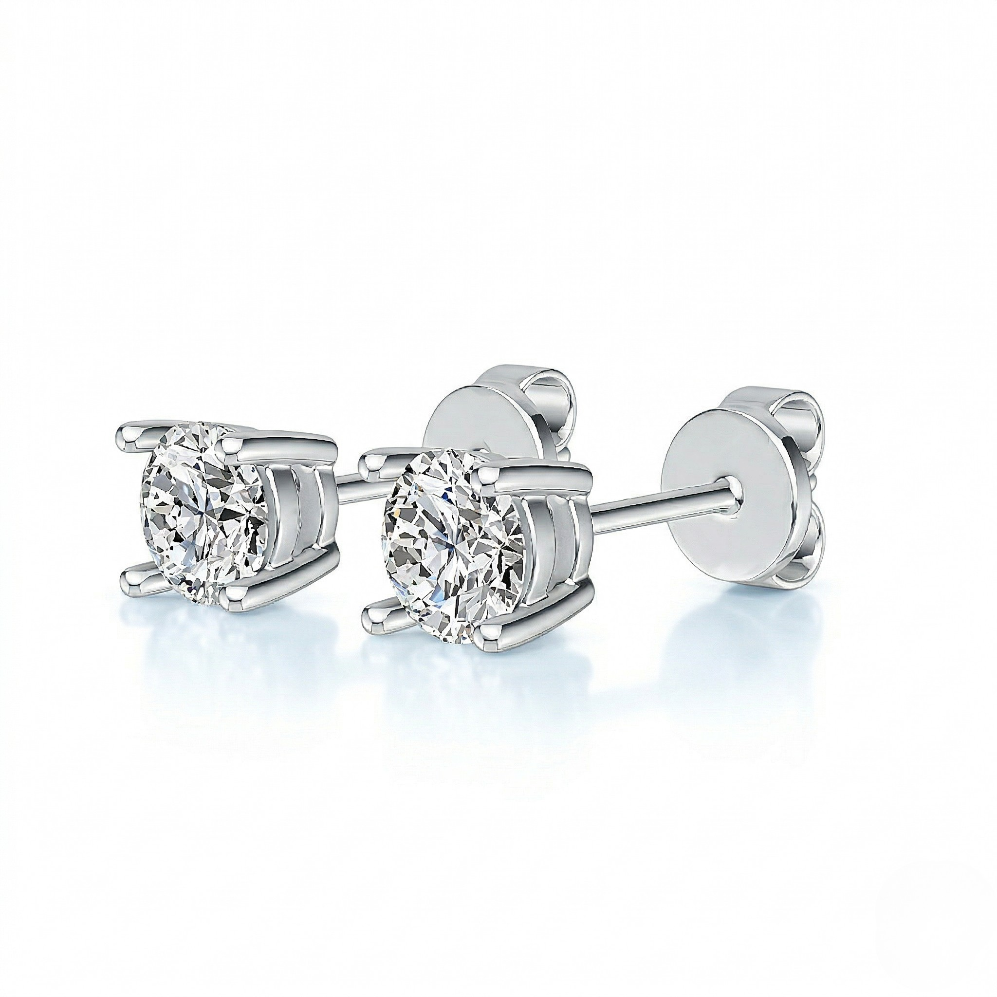 Pair of diamond stud earrings on a white background - 10K Gold Lab Diamond Earrings Basket 0.418ct - J. Collins Jewelry 