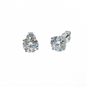 Pair of diamond stud earrings on a white background - White Gold Diamond Earring 1.1ct - J. Collins 