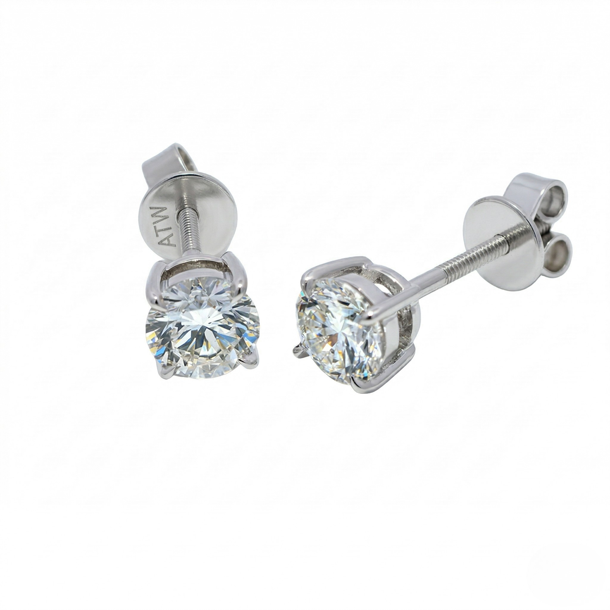 Pair of silver diamond stud earrings on a white background - 10K White Silver Lab Diamond Earrings 0.549ct by J.Collins Jewelry 