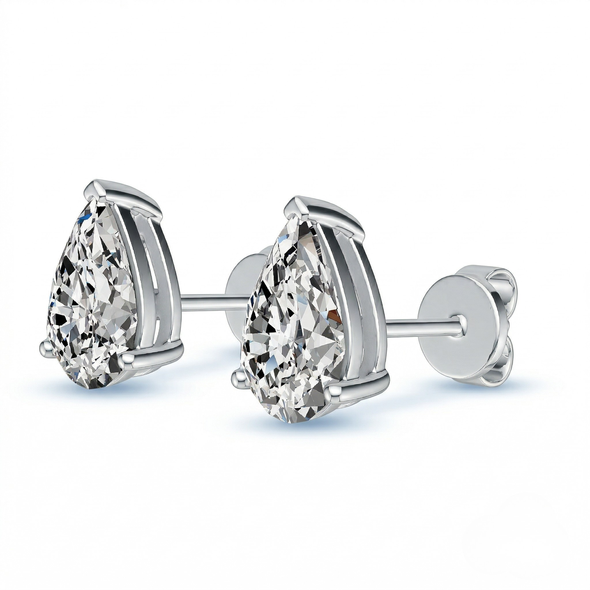 Pair of diamond silver earrings on a white background - 10K White Silver Lab Diamond Earrings 0.549ct by J.Collins Jewelry 