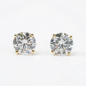 Pair of diamond stud earrings on a white background - 10K Yellow Gold Lab Diamond Earrings Basket 1.1ct - J. Collins Jewelry 