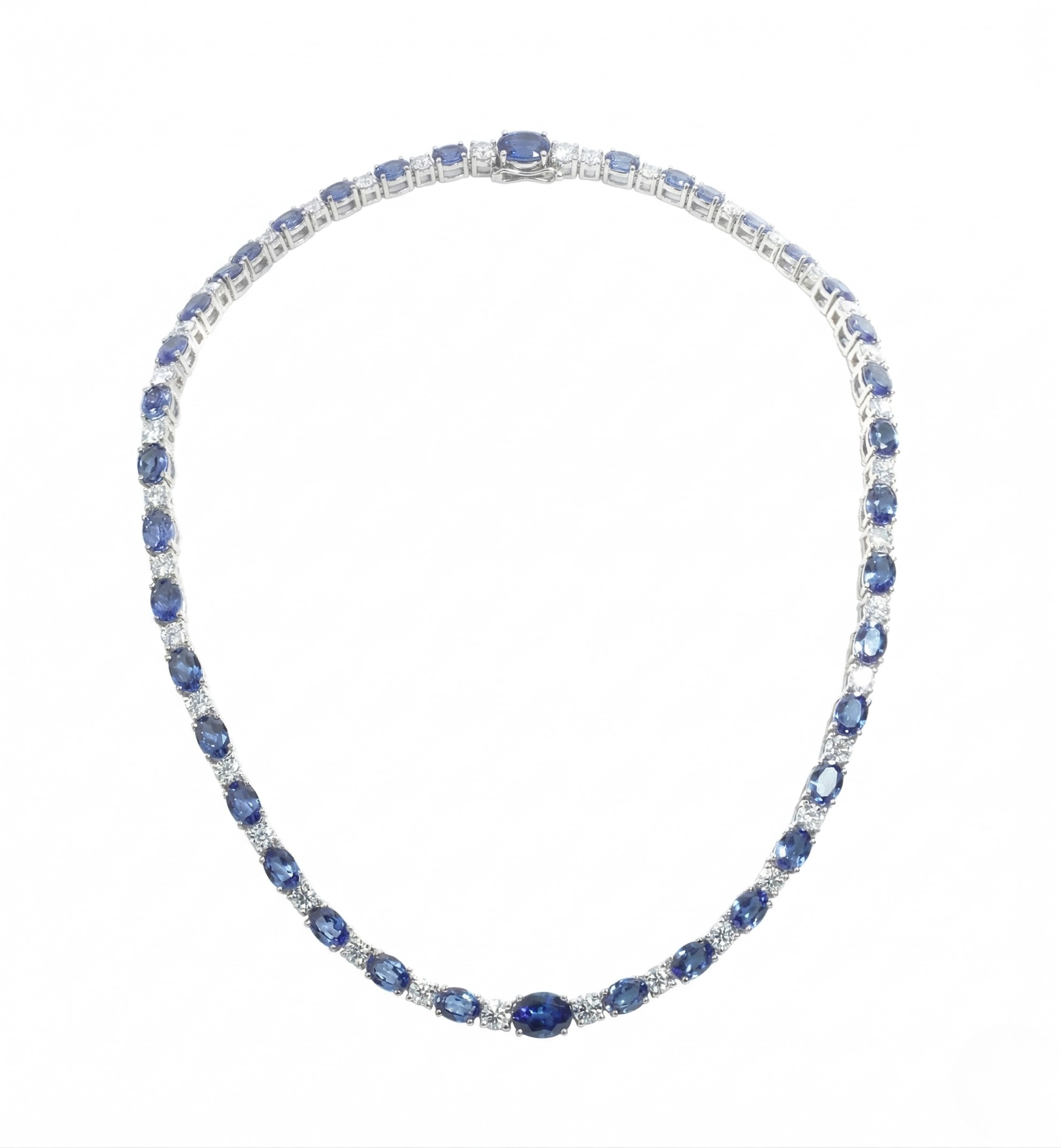 White gold oval blue sapphire and diamond alternating tennis necklace, white background  - 14K White Gold Lab Sapphire Necklace by J.Collins Jewelry 
