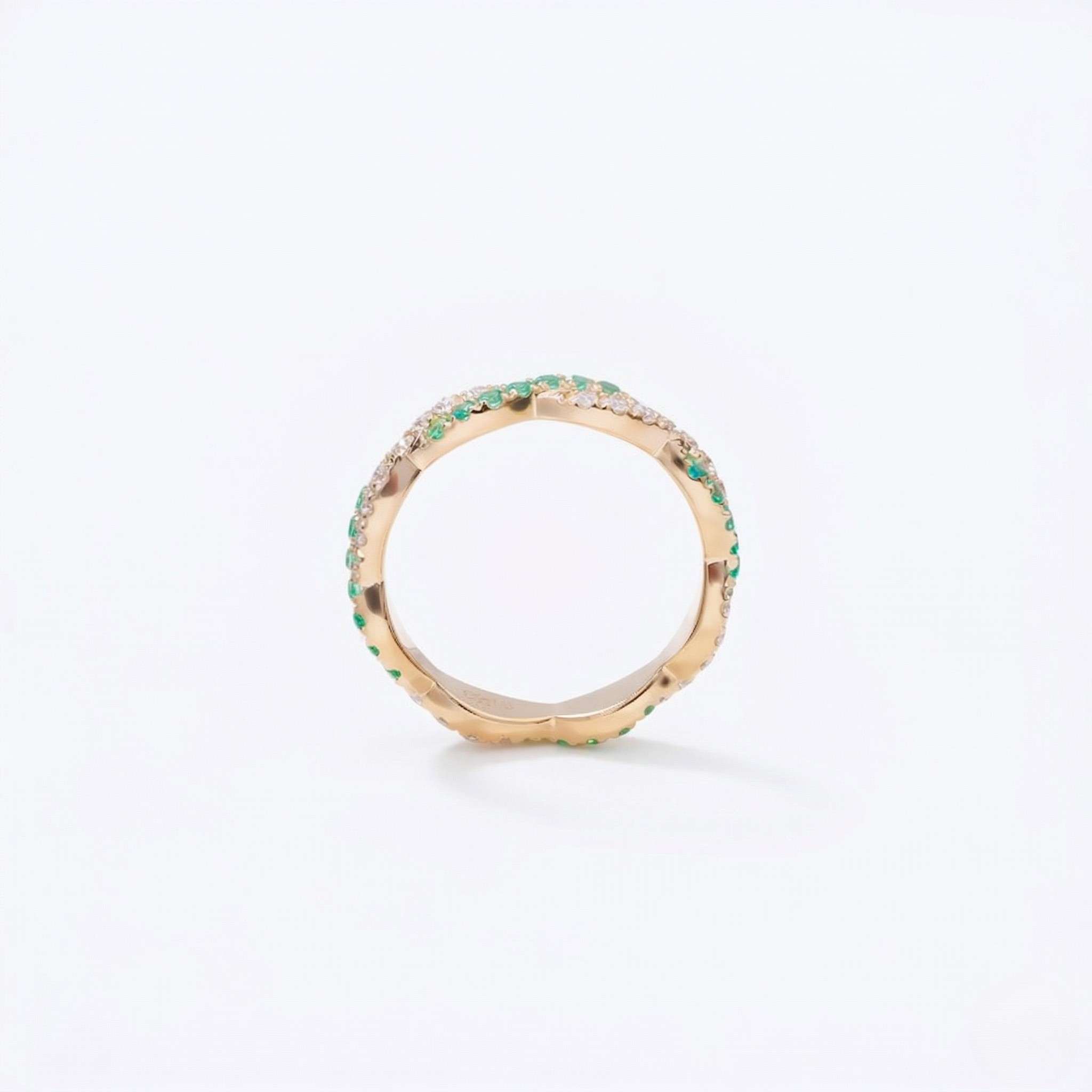 14K yellow gold ring with lab-created emeralds and diamonds in a continuous band design