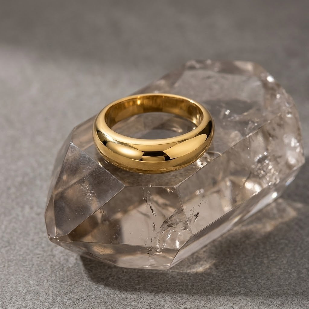 Gold Prime Vault Ring on clear crystal background, classic and polished style