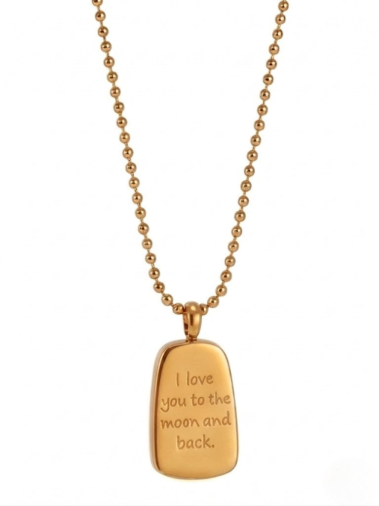 Gold etched medallion chain necklace featuring "I love you to the moon and back" inscription