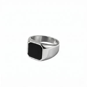 Silver onyx signet ring with black square face, simple design on white background