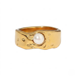 Gold ring with textured band featuring a central white pearl from J.Collins Jewelry