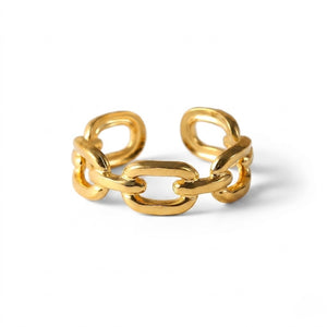 Gold textured linked ring on white background