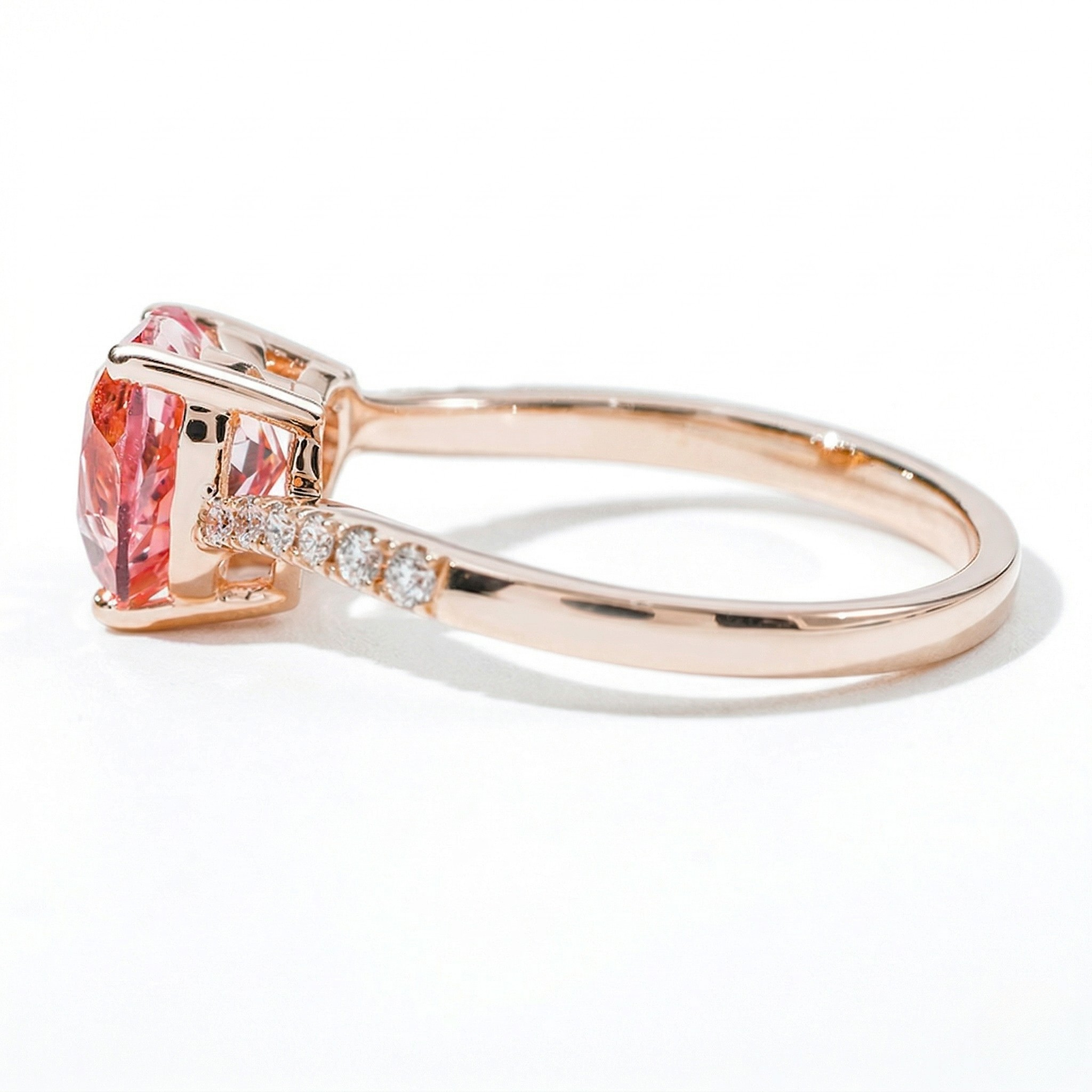 18K rose gold ring with pink gemstone and diamond accents