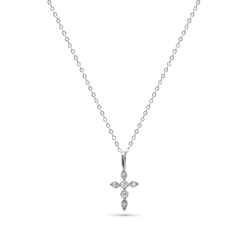 Silver cross pendant necklace on a white chain against a white -Celestial-Pendant-Necklace-JCollinsbackground