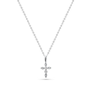 Silver cross pendant necklace on a white chain against a white -Celestial-Pendant-Necklace-JCollinsbackground