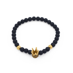 Black beaded bracelet with gold crown charm on a white background-J.Collins Jewelry