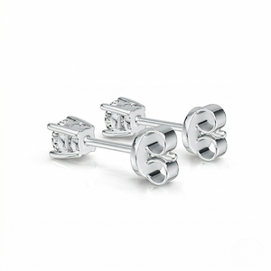 Pair of silver stud earrings on a white background - Diamond Earrings Basket 0.144ct - J. Collins Jewelry 