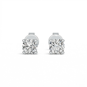Pair of diamond stud earrings on a white background - Diamond Earrings Basket 0.283ct - J. Collins Jewelry 