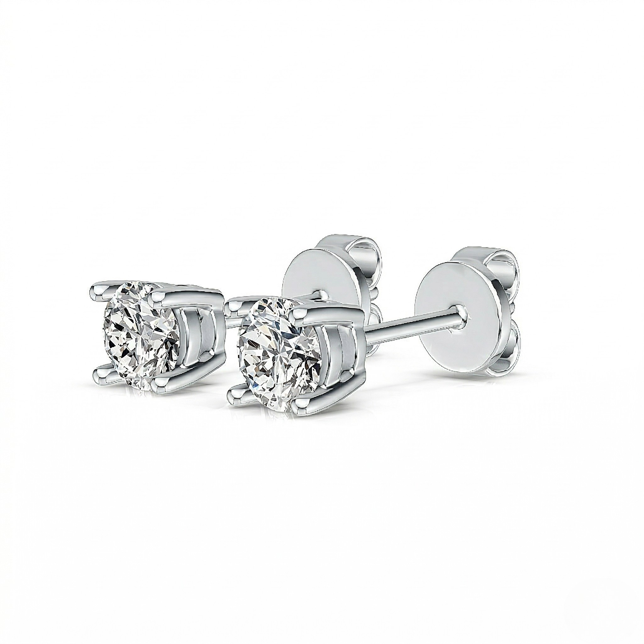 White gold round diamond solitaire stud earrings with four-prong basket setting and butterfly push backs, white background - Diamond Earrings Basket 0.283ct - J. Collins Jewelry 