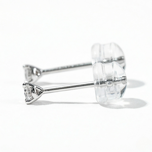 White gold round diamond solitaire stud earrings with three-prong martini setting and silicone backings, white background - Diamond Earrings Martini  0.5oct - J. Collins Jewelry 